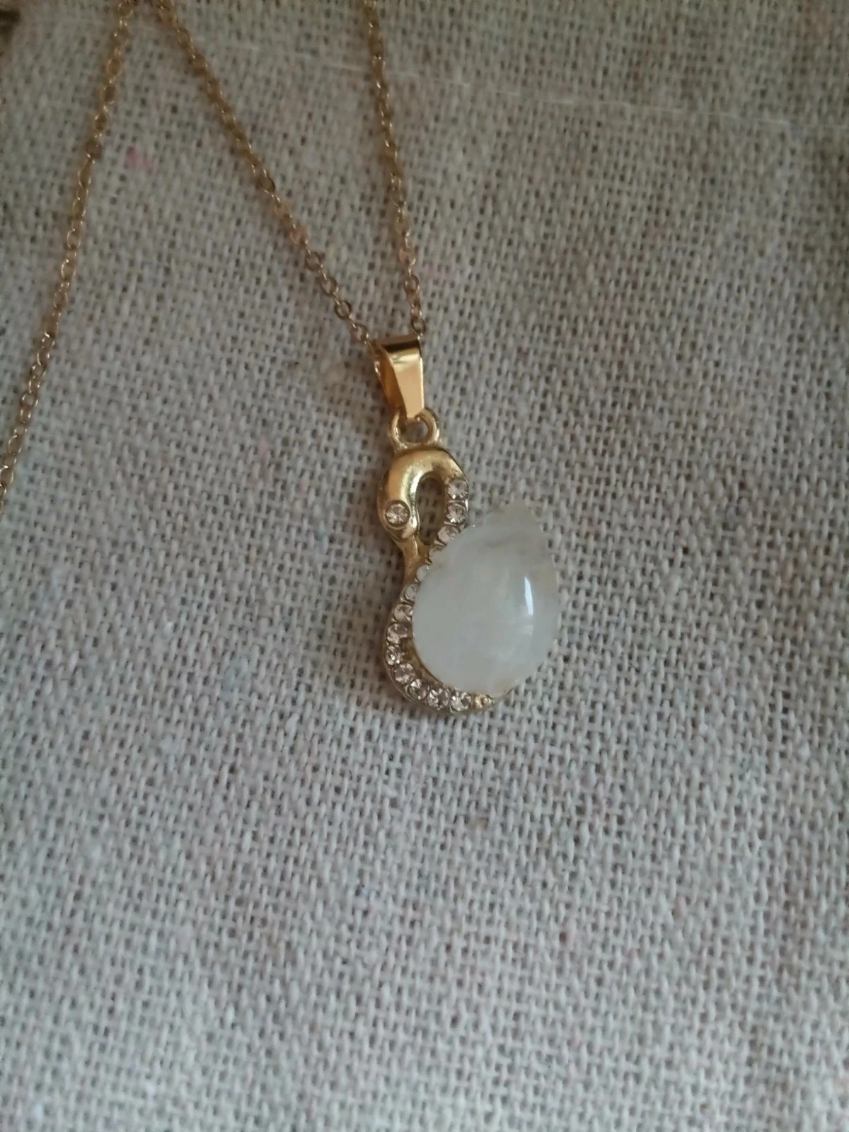 Collier cygne avec pierre de cristal de roche – photo 2